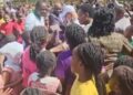 Cheers and Smiles as Kampala Parents’ School Pupils Mob Sudhir Ruparelia